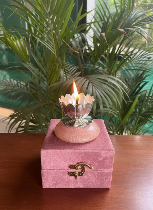Metal lotus diya with resin base in pink velvet box